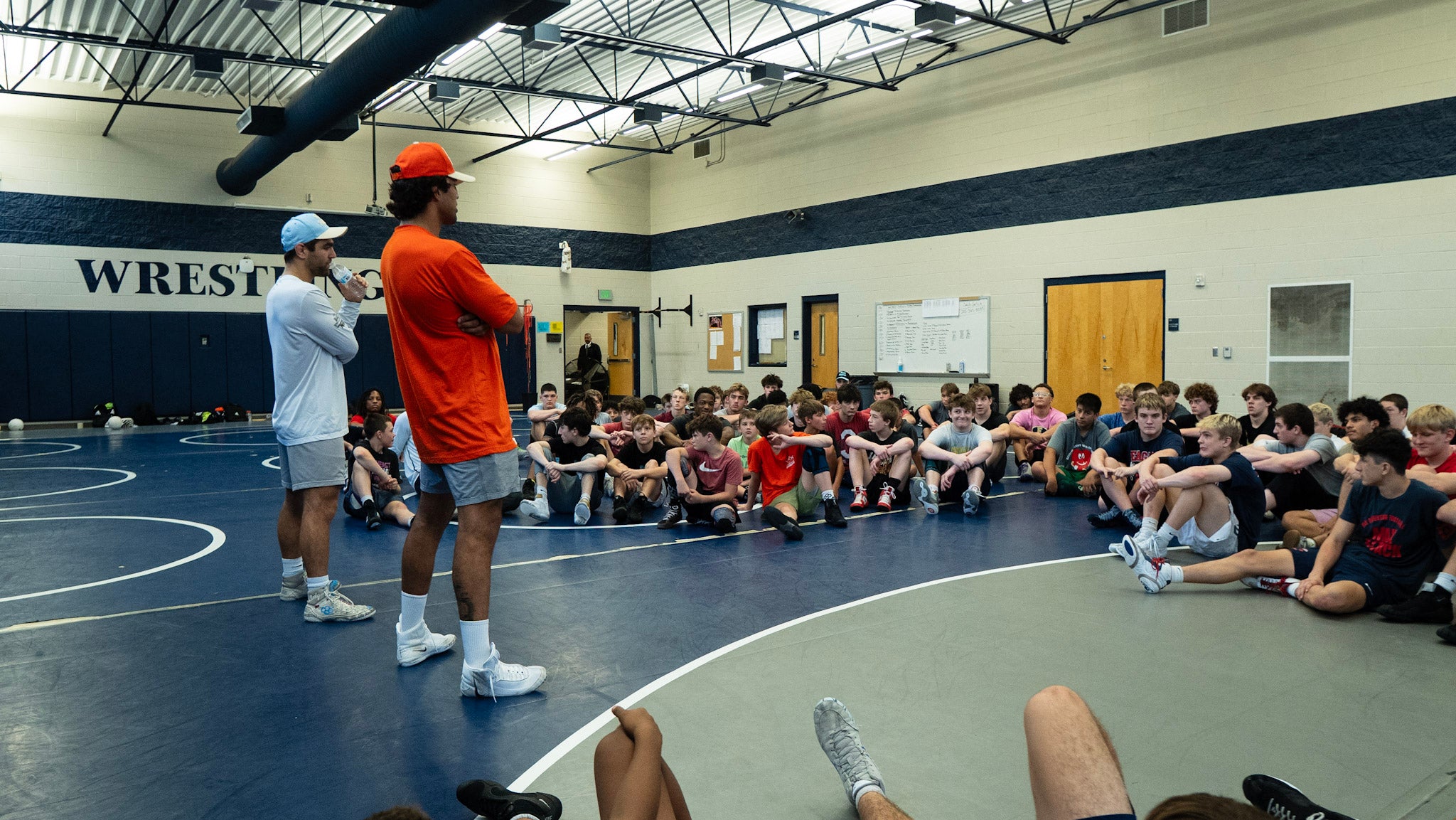 Coaches addressing athletes at Clay-Chalkville