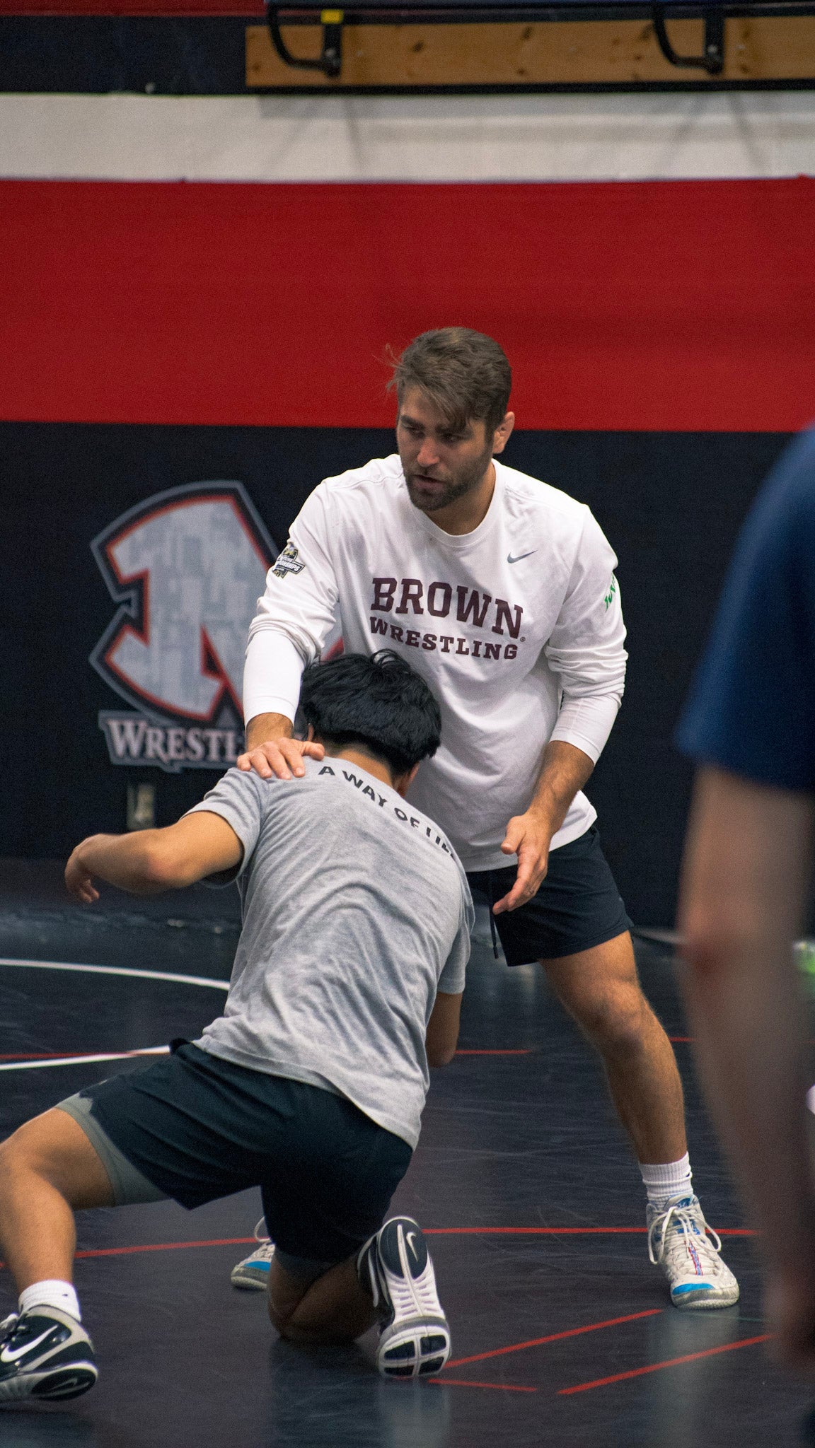 Coach demonstrating technique