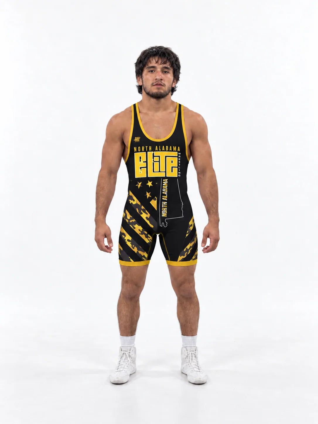 Athlete in a black and gold Elite wrestling singlet