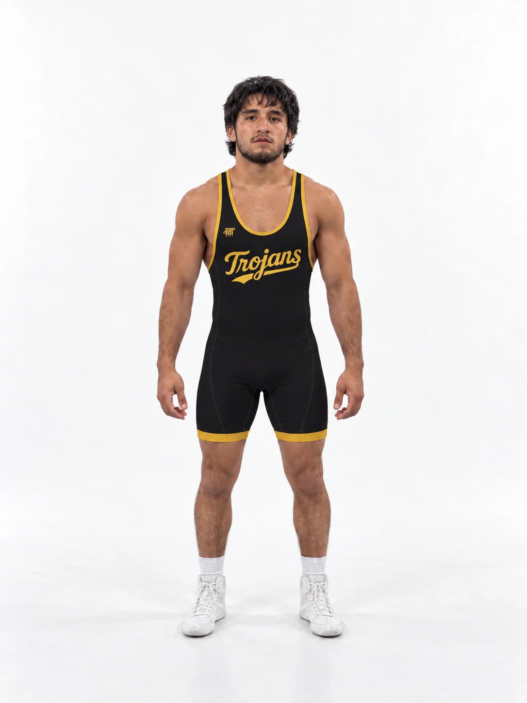 Athlete in a black and gold Trojans wrestling singlet